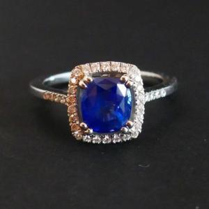 Ring Set With A Sapphire, Diamond Surroundings.