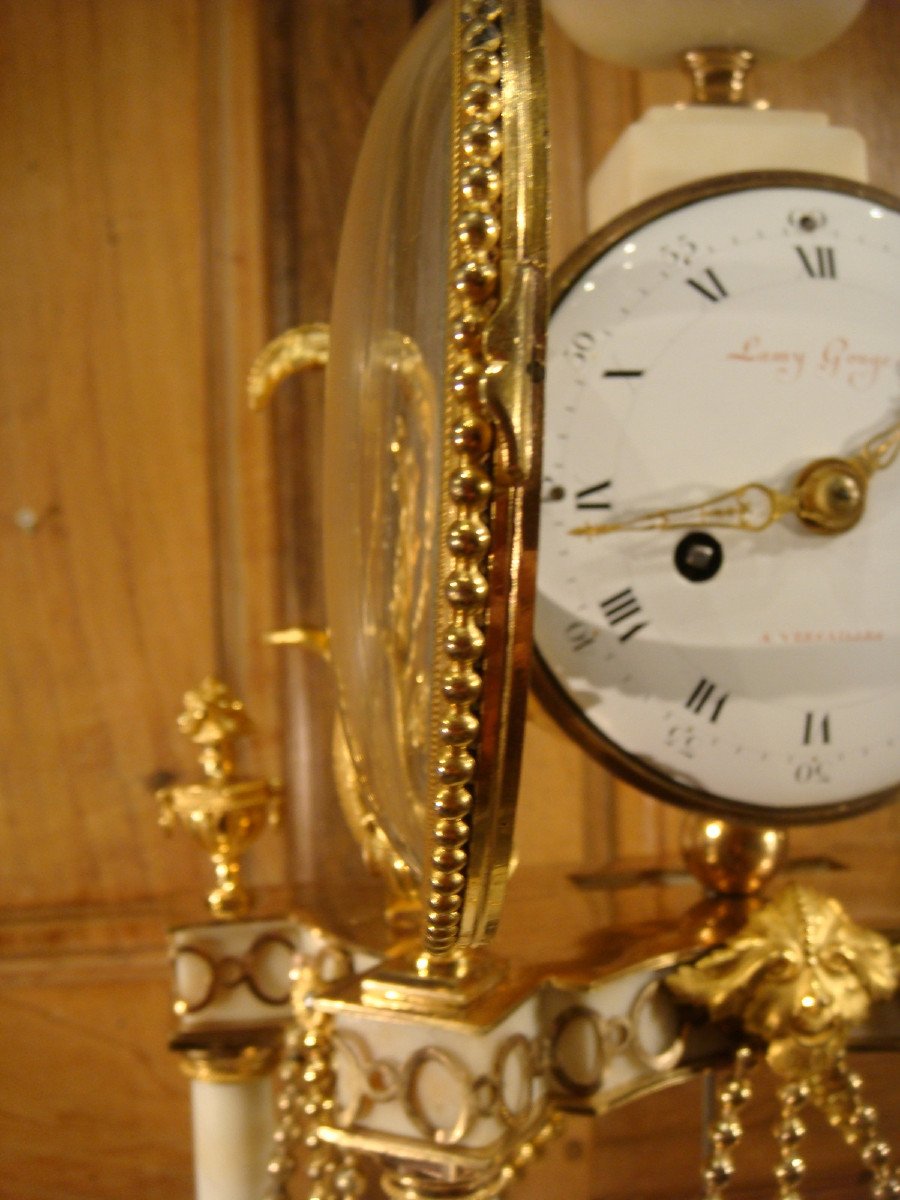 Pendule En Marbre Blanc Et Bronze Dore Epoque Louis XVI -photo-4