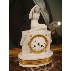 Small Empire Clock In Biscuit Porcelain