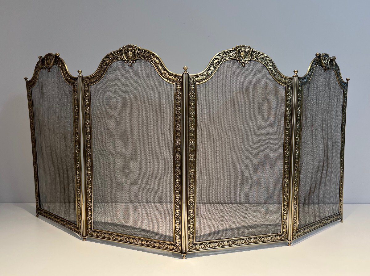 Large Folding Fireplace Screen With 4 Grilling Panels And Framed By An Embossed Brass And Bronze Frieze, Decorated With Macaroons And Garlands Decorated With Rosettes. It Has 2 Removable Handles. French Work In The Louis XVI Style. Stamped Hdf. Circa 1900-photo-2