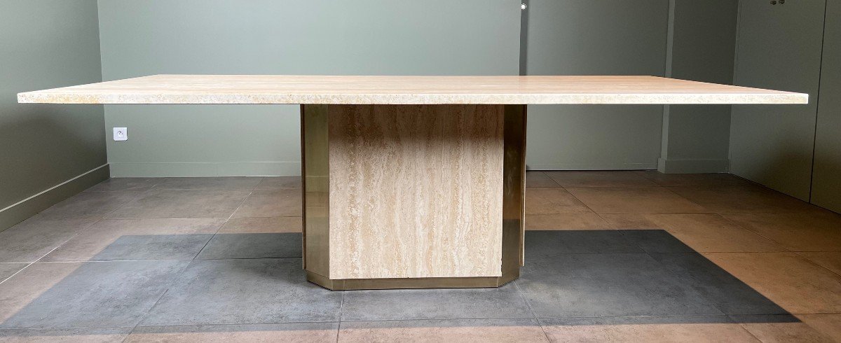 Dining Room Table Made Up Of An Octagonal Travertine Base And Brass Plates