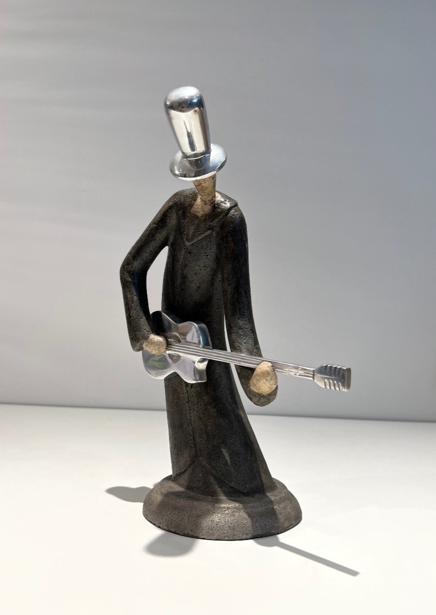 Sculpture Représentant Un Guitariste. Travail Français. Vers 1970