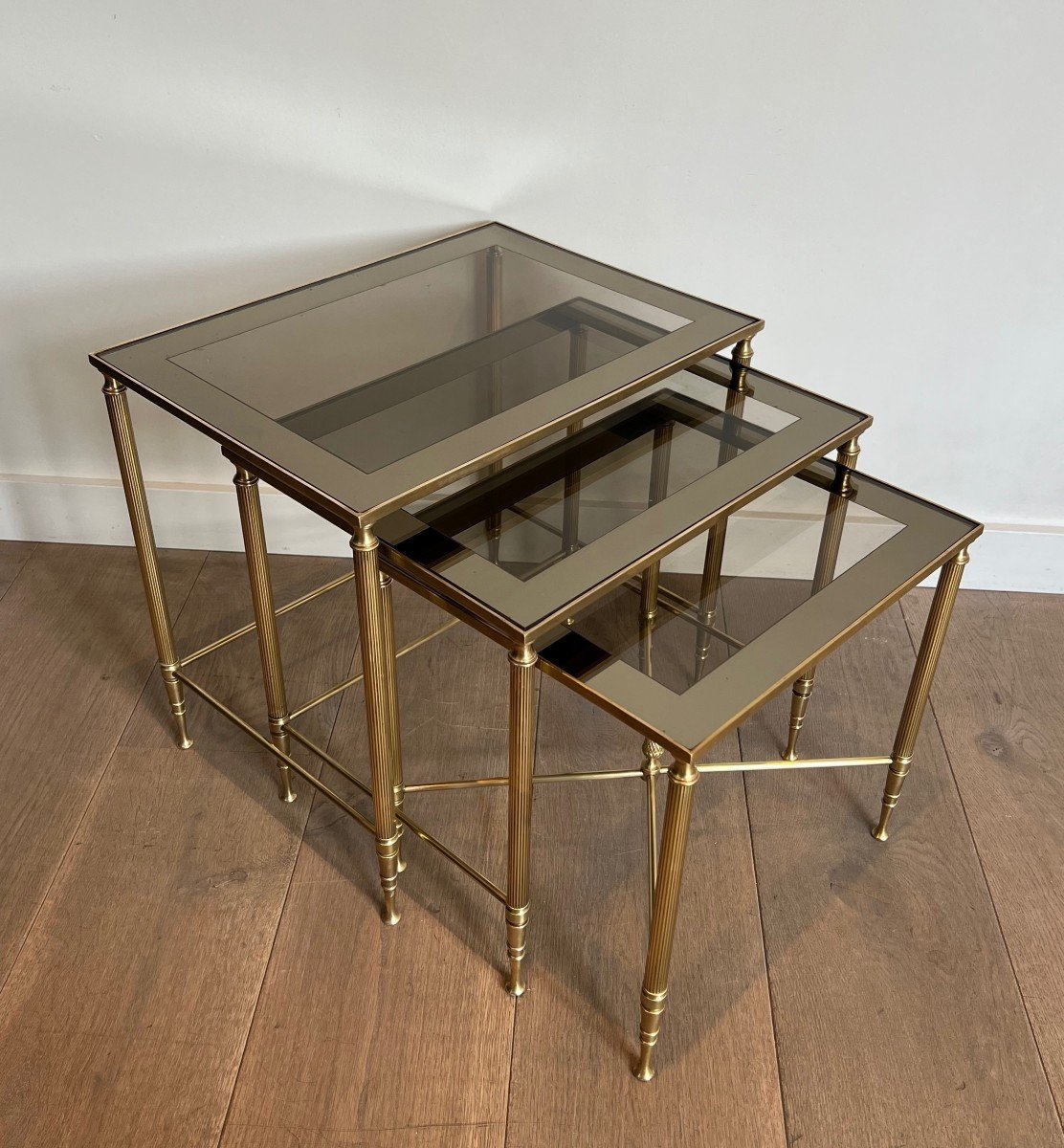 Set Of Neoclassical Style Brass Nesting Tables. French Work By Maison Jansen