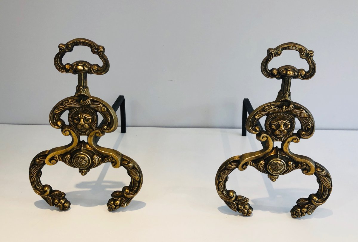 Pair Of Neoclassical Style Bronze And Wrought Ironandirons With Lions Faces. French. Circa 1940