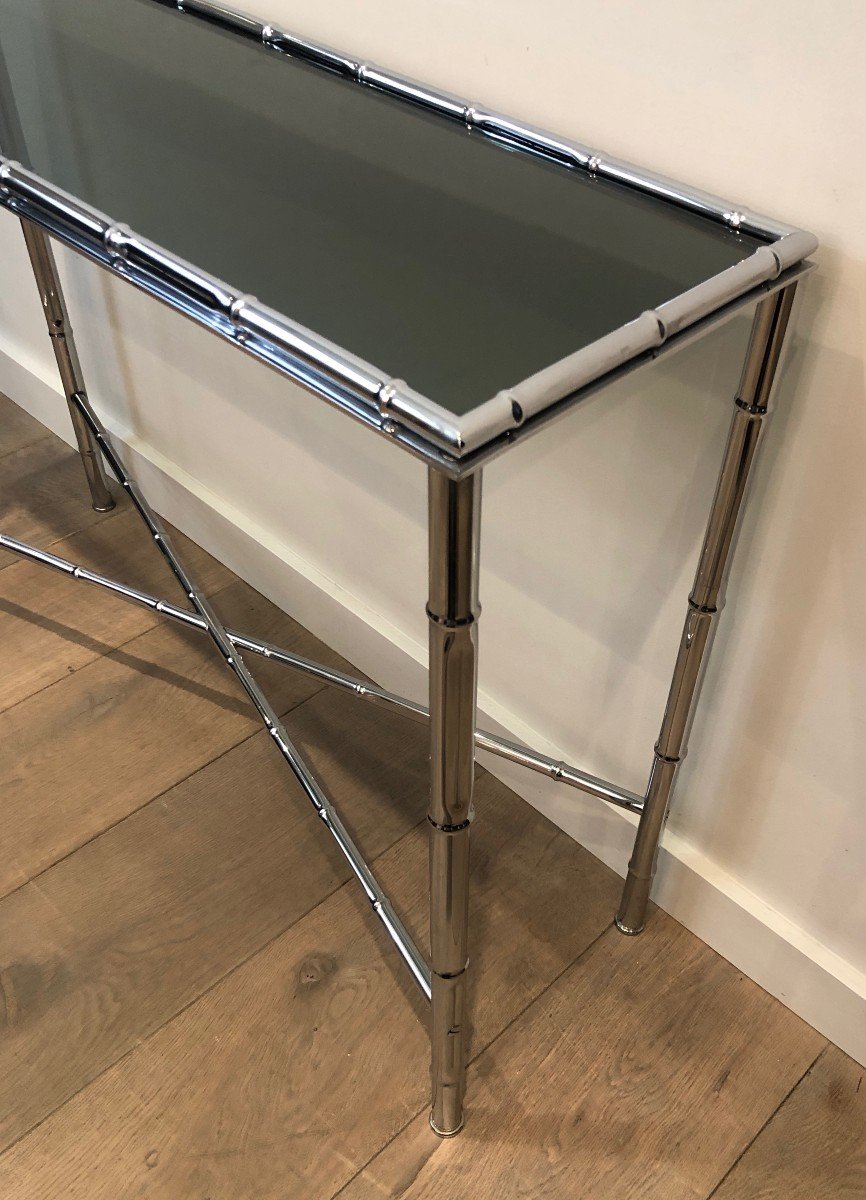 Console Et Son Miroir En Chrome Façon Faux-bambou. Dans Le Goût De La Maison Bagués. Vers 1970-photo-1