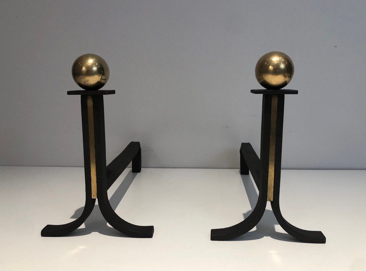 Pair Of Modernist Style, Iron And Brass Andirons. French Work,  In The Style Of Jacques Adnet