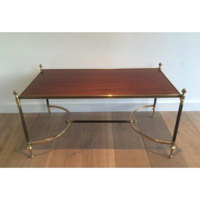 Table basse à structure métal brossé laiton et bronze, plateau en bois.