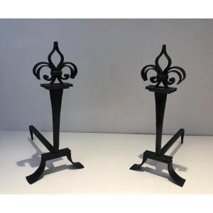 Pair Of Wrought Iron Andirons Topped With Fleurs De Lys. French Work. Around 1950