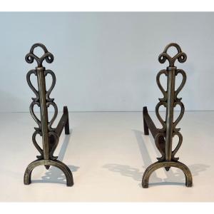 Pair Of Brass And Wrought Iron Andirons. French Work In The Taste Of Raymond Subes. Verse 1