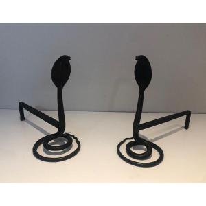 Pair Of Battered Wrought Iron Andirons With Cobras. French Work In The Style Of Edgar Brandt