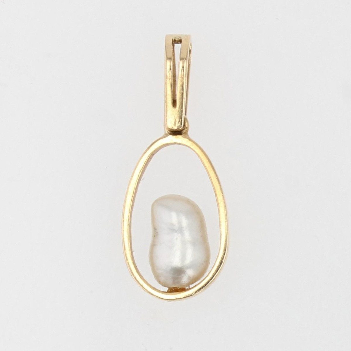 Gold Pendant And Its Baroque Pearl-photo-1