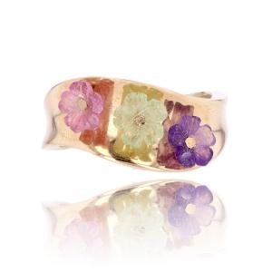 Gold Ring And Its Flowers In Fine Stones