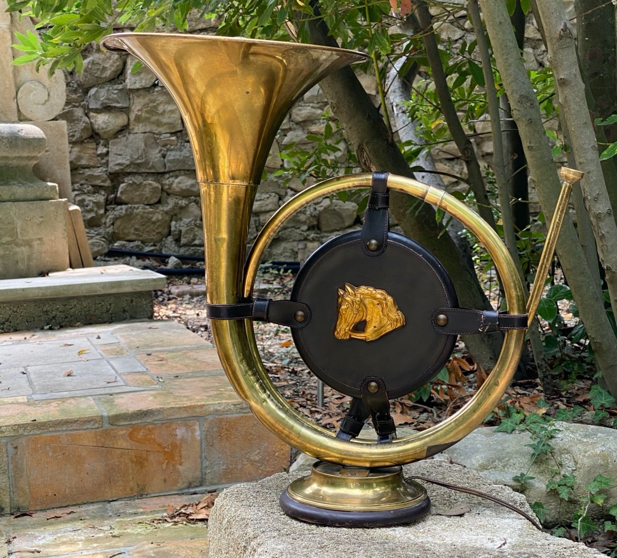 Old Hunting Horn Lamp With A Horse Head On A Leather Background Attributed To Hermes