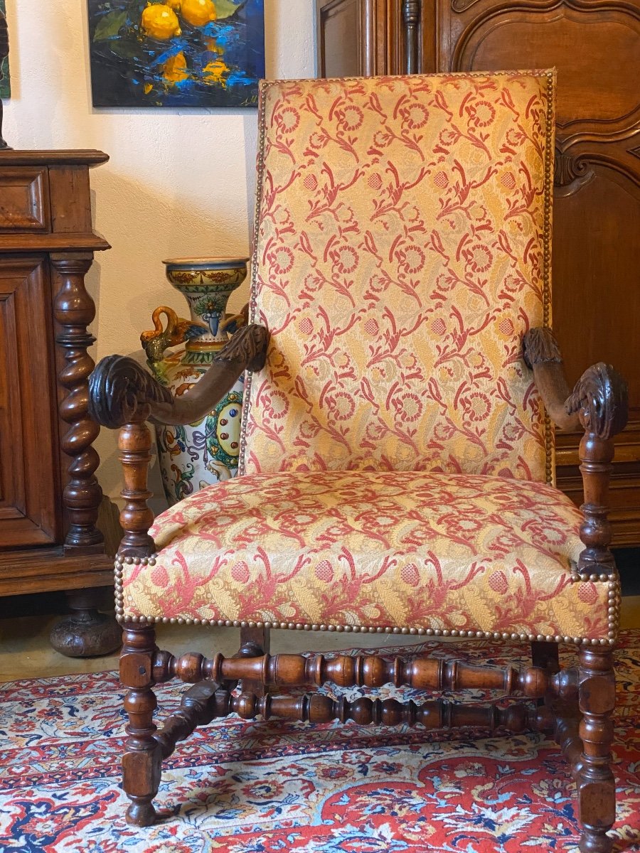 Louis XIII Period Armchair From The 17th Century In Walnut Upholstered With Bordeaux Ramagres Fabric On A Gold Background