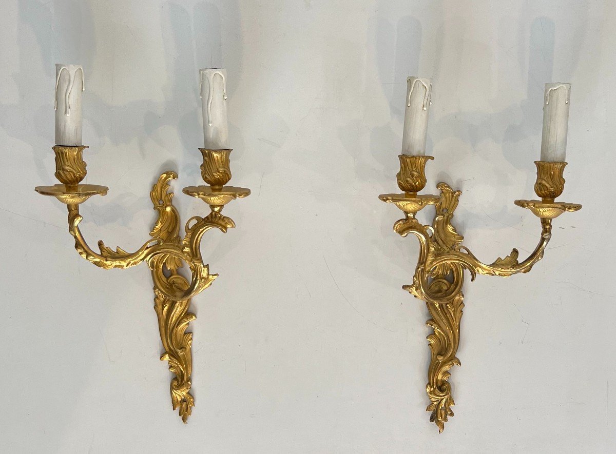 Pair Of Gold Gilt Bronze Sconces. French Work In The Style Of Louis The 15th. Circa 1940