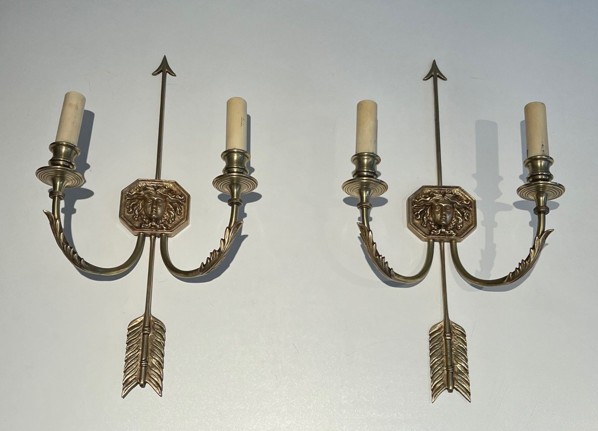 Pair Of Bronze Wall Sconces Presenting A Bronze Arrow Bearing The Effigy Of The Sun King. 