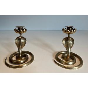 Pair Of Cobra Candlesticks In Chiseled Bronze. French Work. Around 1940