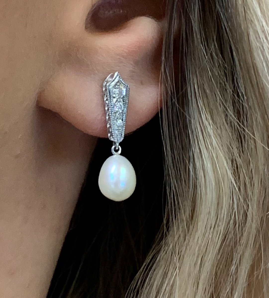 A Pair Of Pearl Dangle Earrings