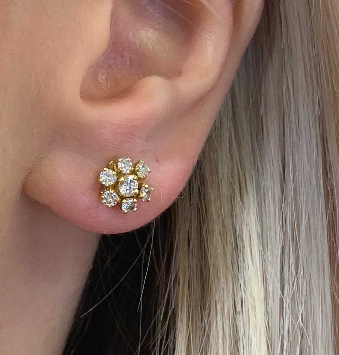 A Pair Of Diamond Flower Earrings