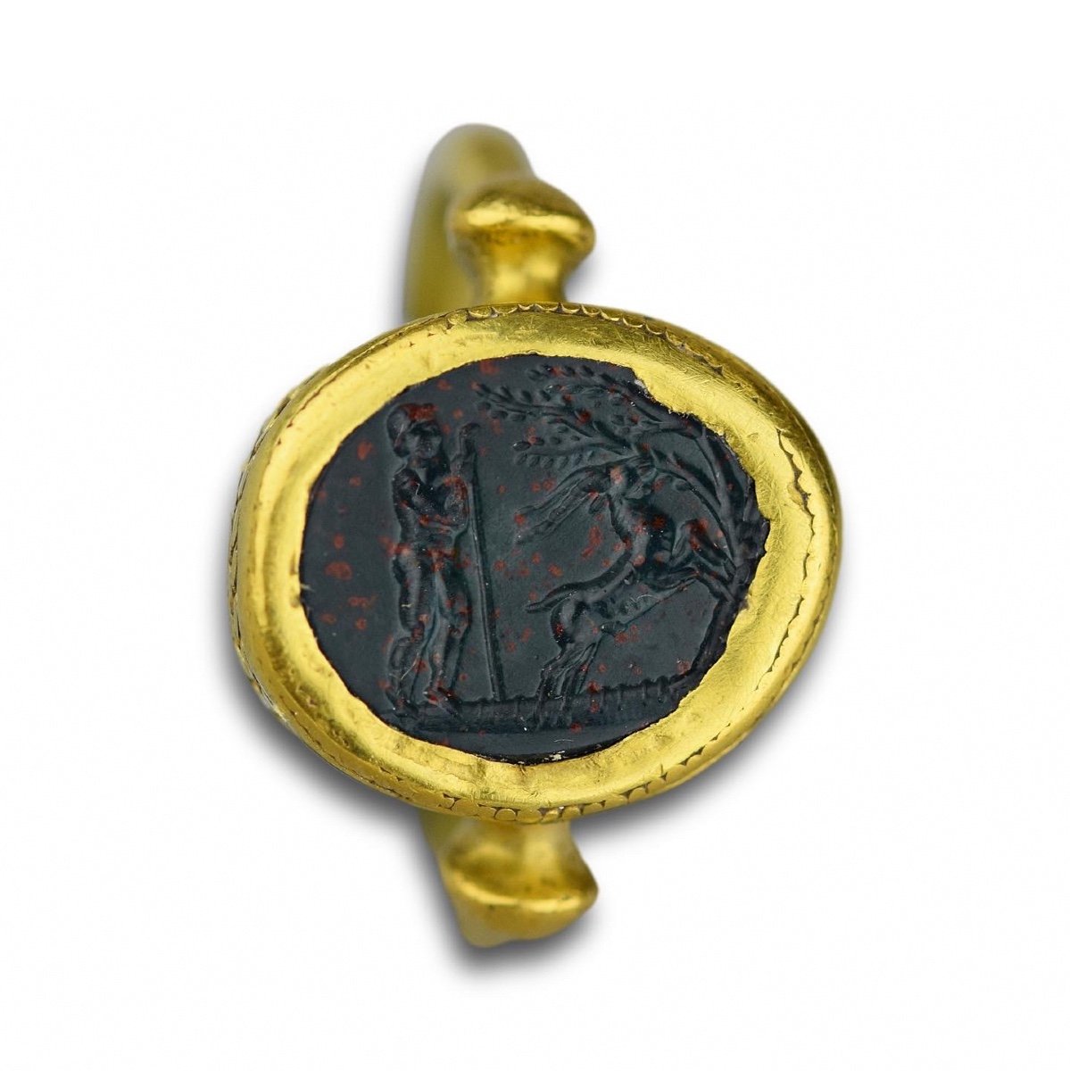 Ancient Gold Ring Set With A Bloodstone Intaglio, 1st Century Bc/ad.