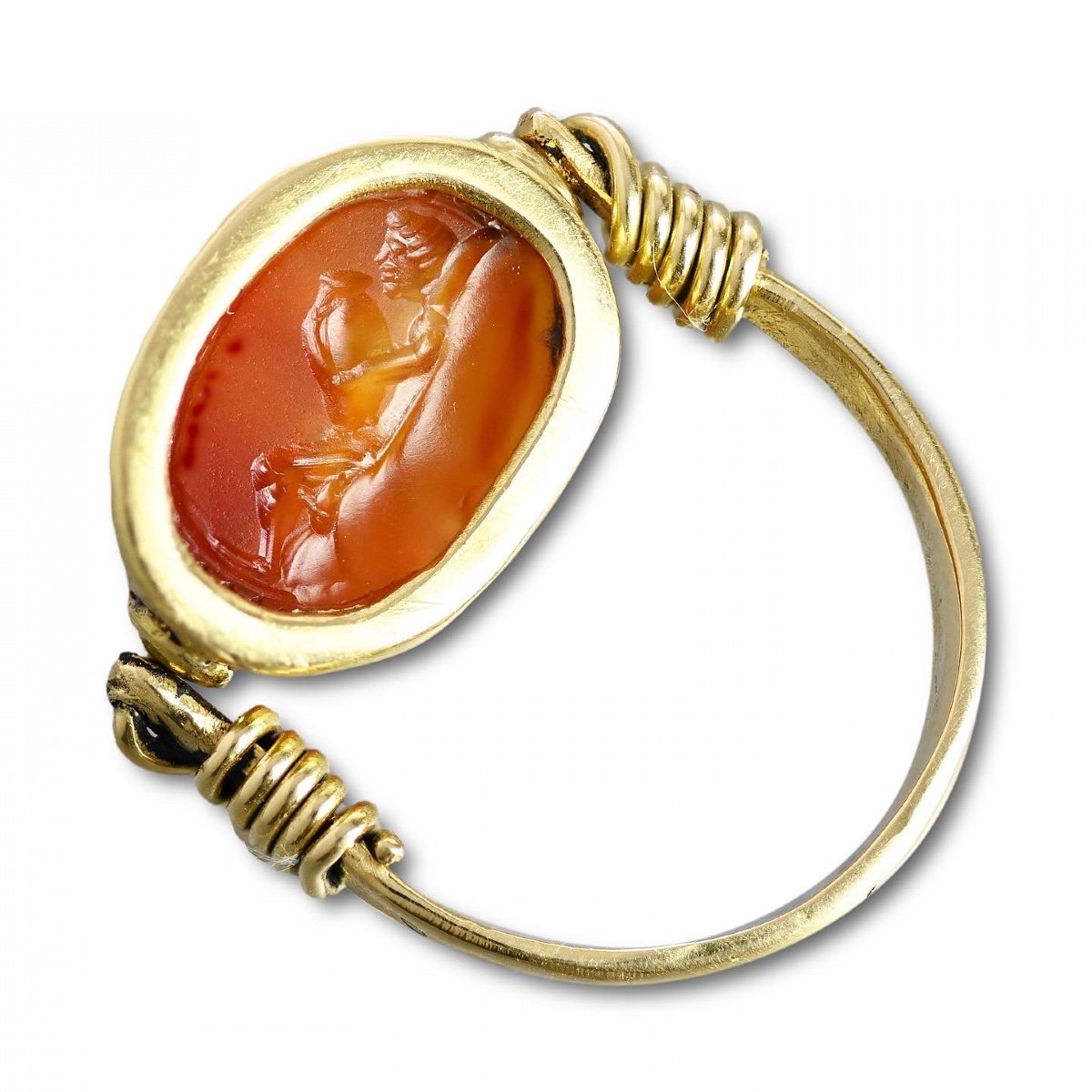 Gold Ring With An Etruscan Carnelian Scarab Of A Figure Carrying An Amphora.-photo-1