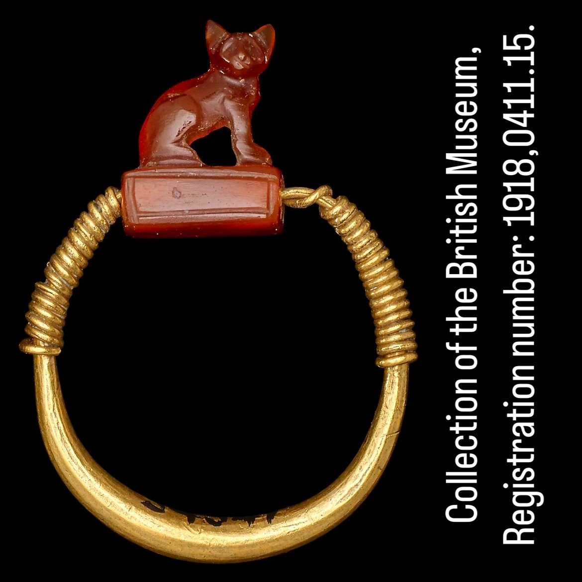 Ancient Egyptian Gold Ring Set With An Agate Amulet Of A Recumbent Bull.-photo-1