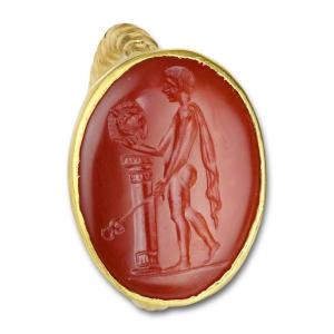 Bague En Or Avec Une Intaille En Cornaline d'Hermès Kriophoros. Romain, 1er Siècle Avant Jc.