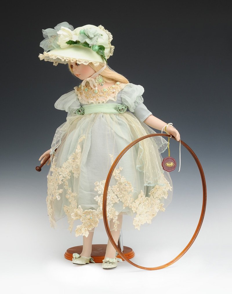 Collectible Doll From The Mundia Brand From The 1990s. Young Girl With A Hoop-photo-1