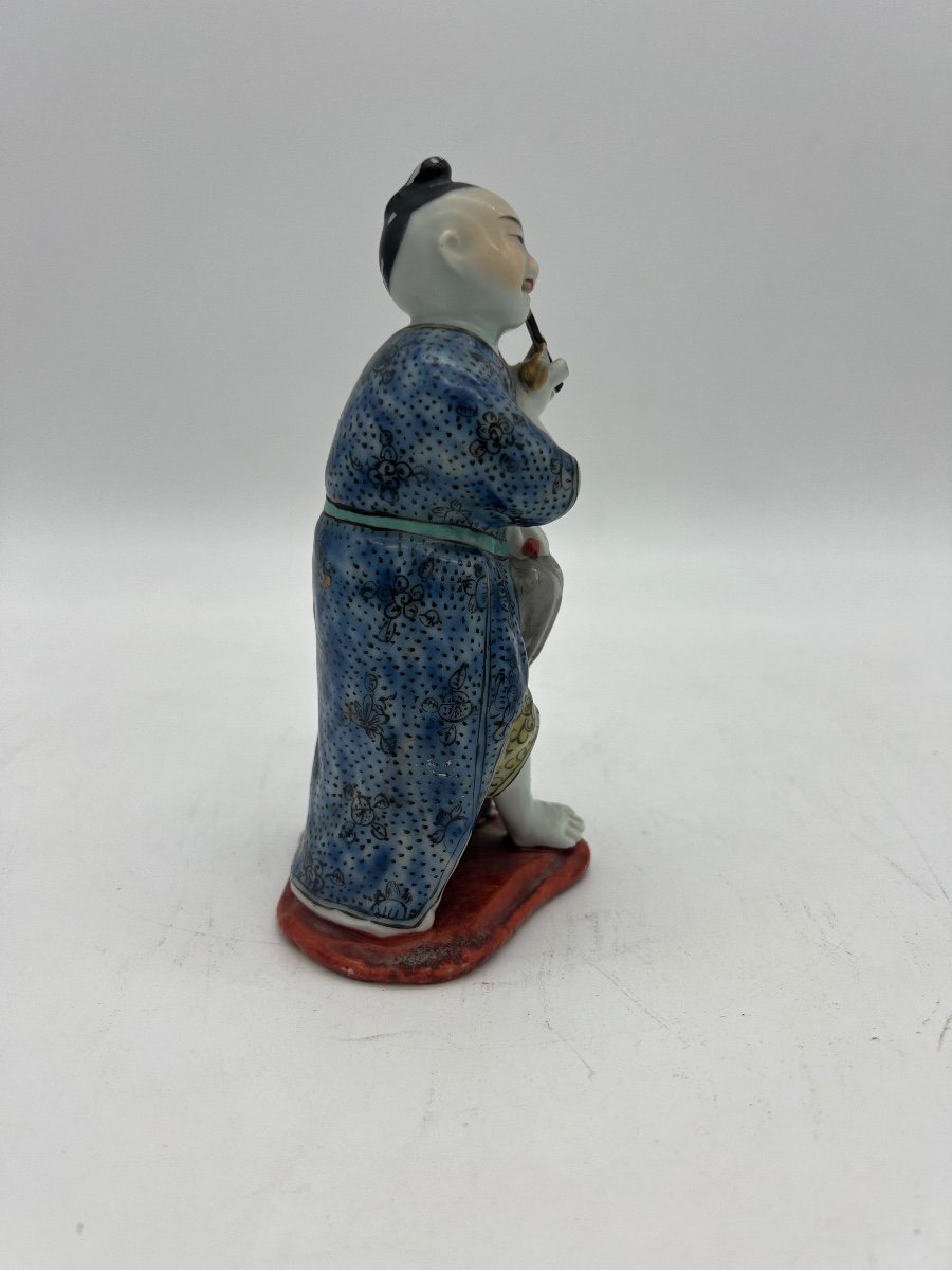 Small Polychrome Porcelain Statue. -photo-4