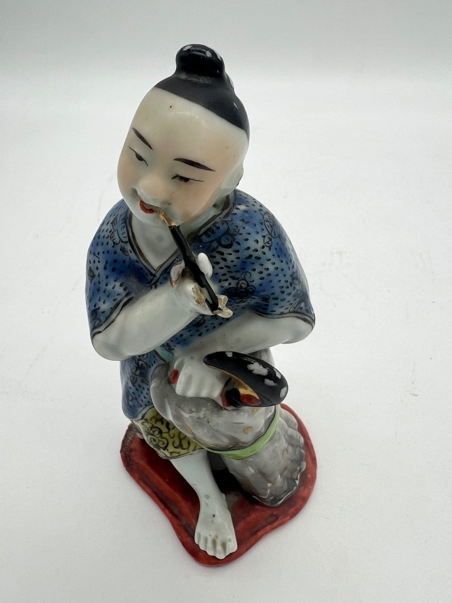 Small Polychrome Porcelain Statue. -photo-2