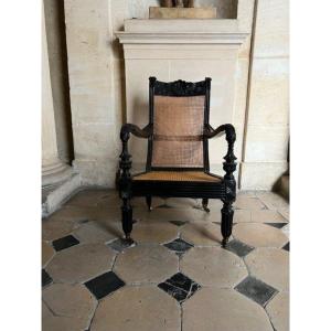 An Anglo-indian Armchair In Carved Ebony Wood