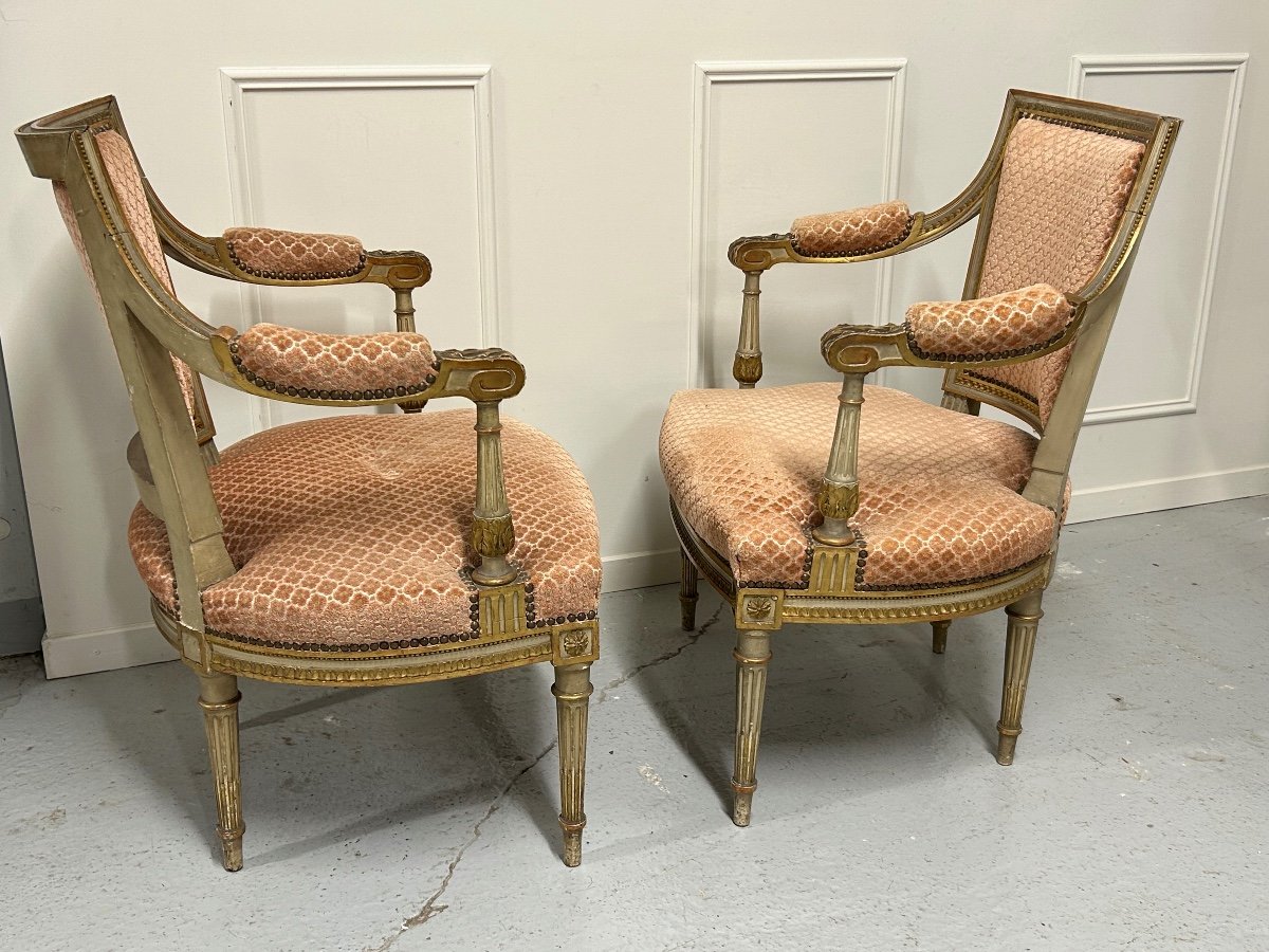 Pair of Louis XVI gilded armchairs with cane seat and back