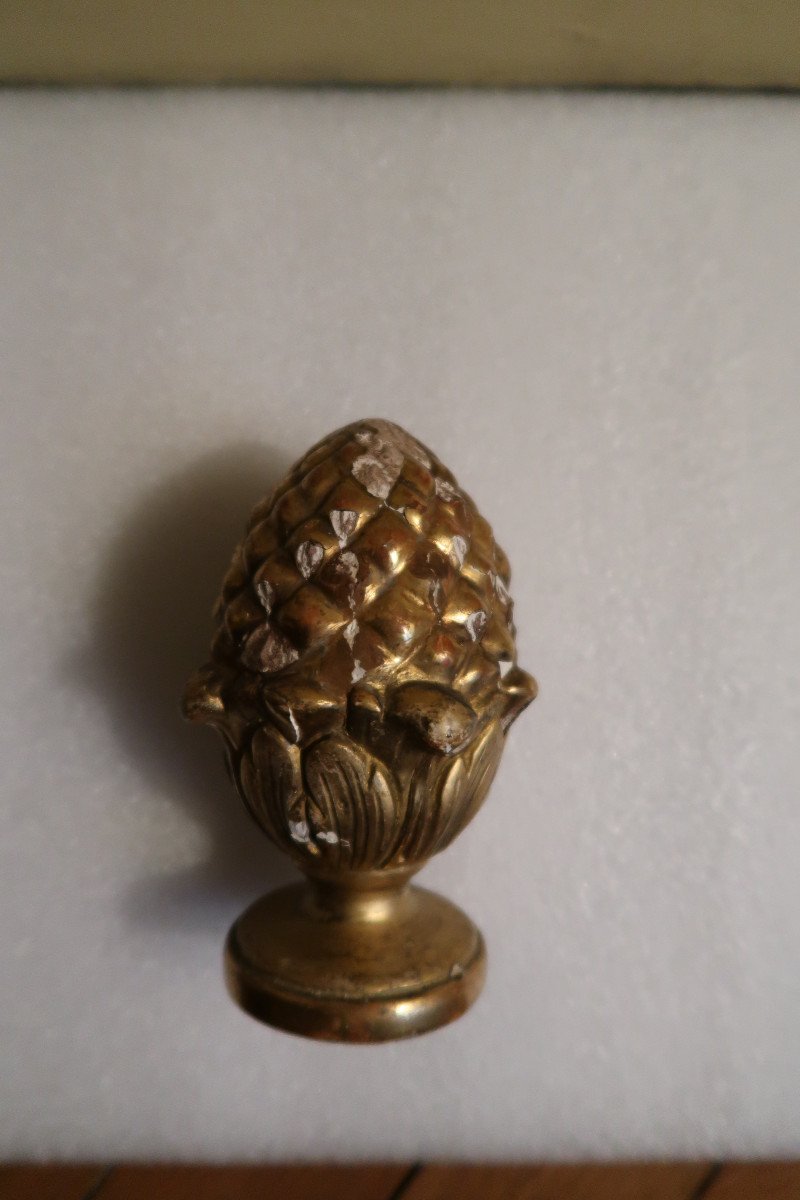 Two Pine Cones In Golden Wood -photo-4