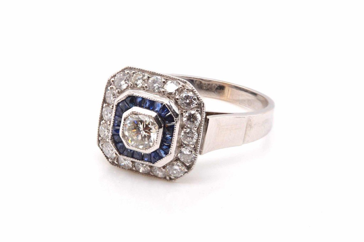 Calibrated Diamonds And Sapphires Ring In Gold And Platinum