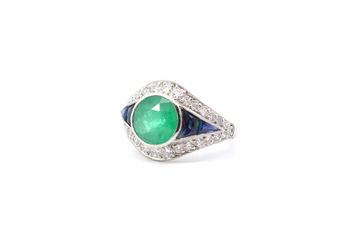 Emerald, Diamond And Sapphire Ring In Platinum