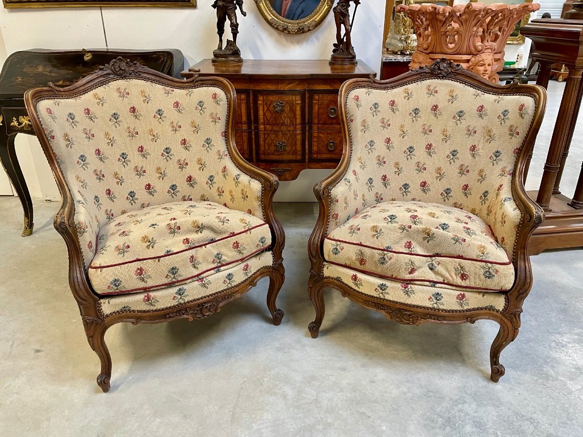 A Pair of Louis XV Style Walnut Armchairs. 