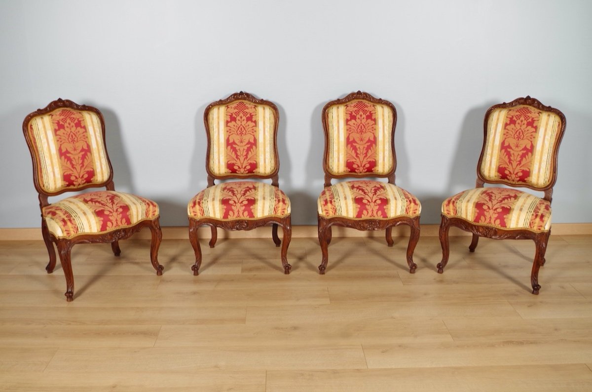 Four Regency Style Walnut Chairs