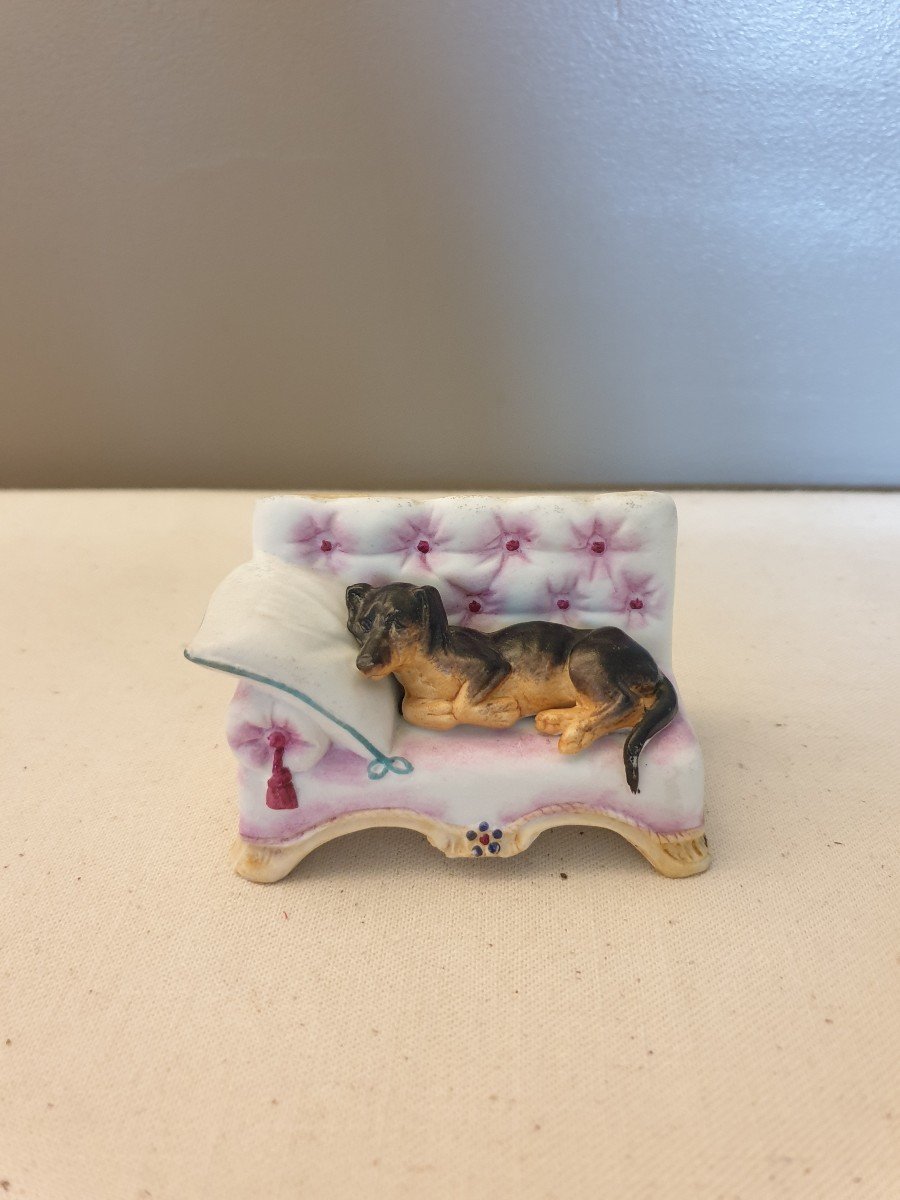 Little Biscuit Dog On A Bench. Porcelain