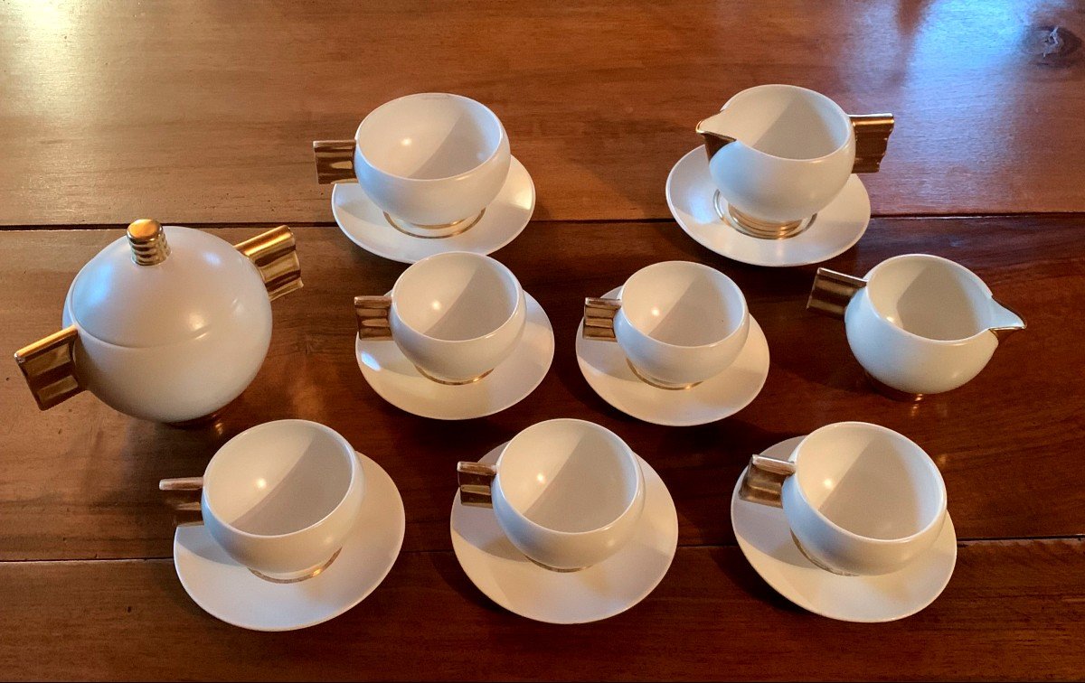 By Robj, Part Of A Tea Service, From The "art Deco" Period, In White Porcelain, Gold Handles And Frétel 