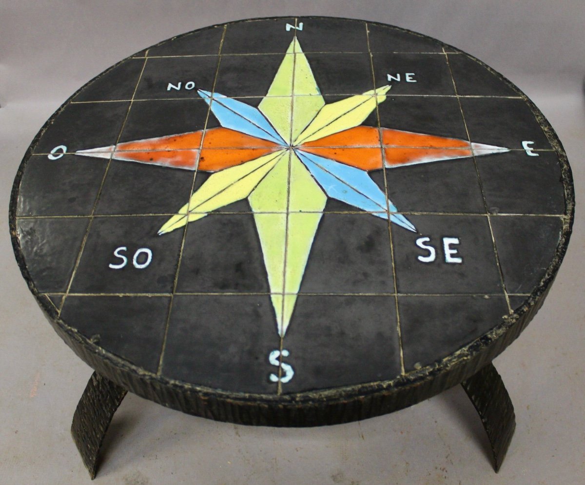 Wrought Iron Coffee Table With Ceramic Compass Rose Top -photo-3