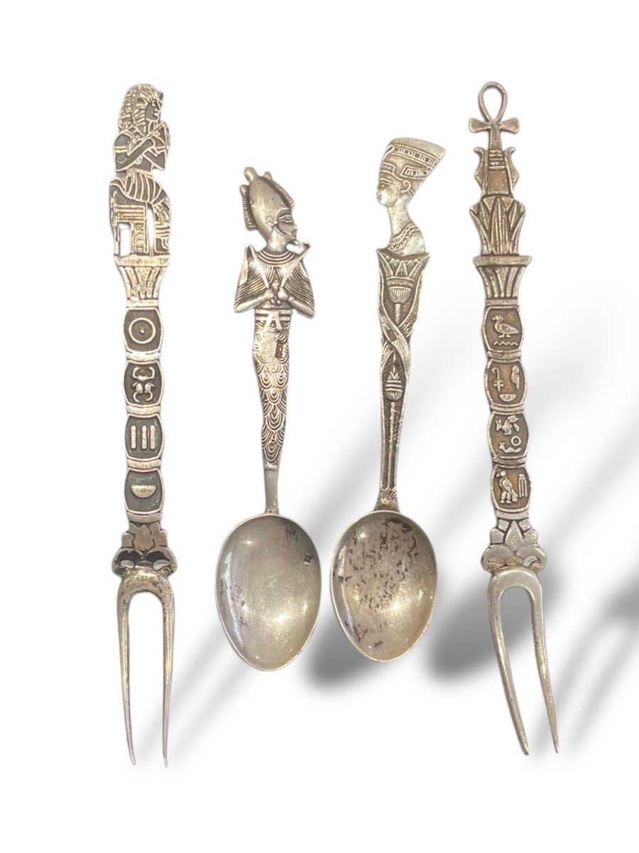 Pair Of Egyptian Style Silver Cutlery