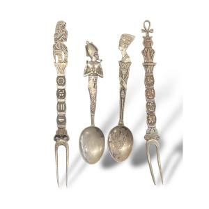 Pair Of Egyptian Style Silver Cutlery