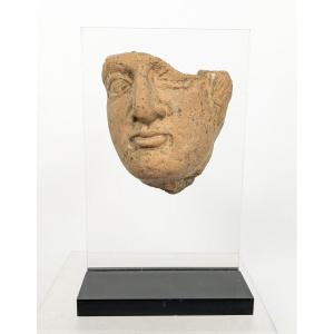 Fragment de visage, terre cuite, Rome -- Bas Empire Ier-IVe siècle