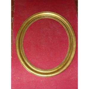 19th Century Oval Frame, In Gilded Wood.