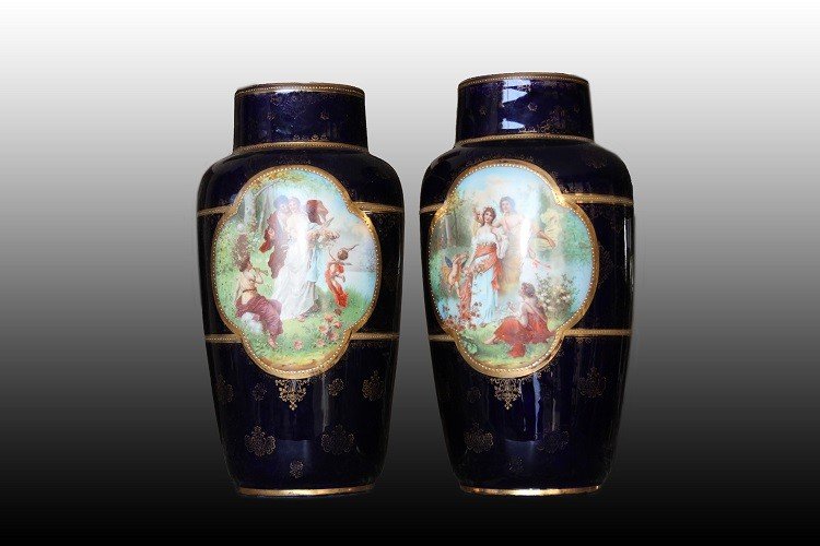 A Pair Of Austrian Vases From The Vienna Manufactory, Made Of Porcelain, Featuring Scenes In A 