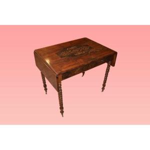 French Flip-top Table From The Mid-1800s, Charles X Style, In Flamed Walnut Wood. It Features 