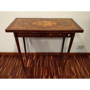 The Dutch Mahogany Game Table, Rectangular In Shape, Rests On Four Turned Legs Richly Inlaid 