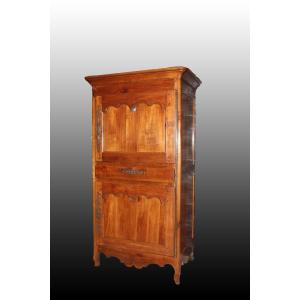 Large French Wardrobe From The Mid-1800s, Provençal Style, Made Of Cherry Wood. It Features 2 C