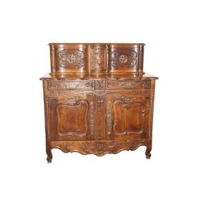 Late 1800s French Provençal Double Body Walnut Armoire, Featuring A Waved Upper Body With 3 Doo