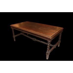 Large French Fixed Table From The Early 1800s In Walnut Wood. It Features Finely Carved Edging 